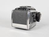a small camera that is sitting on a white surface