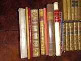 a lot of books that are sitting on a table