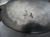 a lot of silver spoons sitting on a table