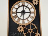 a clock that has gears on it on the wall