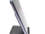 a cell phone that is sitting on top of a stand