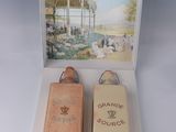 two wooden boxes that are sitting on a table