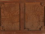 a picture of an old wooden cabinet with graffiti on it