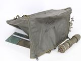 an image of a bag with some items in it on a white surface