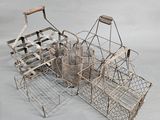 several metal baskets with handles and handles are stacked on top of each other
