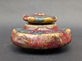 an image of a small ceramic object on a table