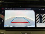 a picture of a car ' s rear view camera on the dashboard