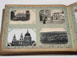 an open book with pictures of different buildings on it