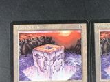 two cards with a picture of a mountain and a cliff on them