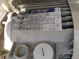 a close up of an electric motor with a label on it