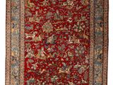 a red and blue rug with a floral design