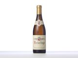 an image of a bottle of wine sitting on top of a table