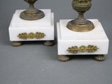 pair of antique brass and marble urns on pedestals