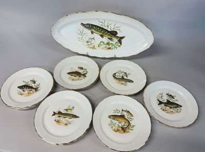 six plates with fish on them sitting on a table
