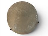 an image of a metal object on a white surface