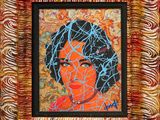 a painting of a woman ' s face in a gold frame