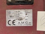 a picture of a red machine with a sticker on it