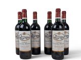 three bottles of red wine sitting next to each other on a white surface