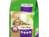 a bag of cat ' s best cat litter with a cat laying on the floor