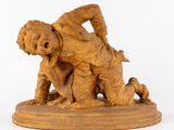 statue représentant un garçon et un chien sur un socle, avec un fond blanc