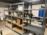 shelves with pots and pans on them in a kitchen