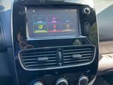 a car dashboard with a digital display in the center