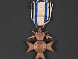 a close up of a medal on a black surface