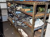 a room with a bunch of items on the shelves