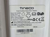 a close up of the back of a white refrigerator