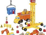 un jeu de construction comprenant une grue et des engins de chantier