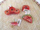 three pieces of watermelon and a slice of watermelon on the table