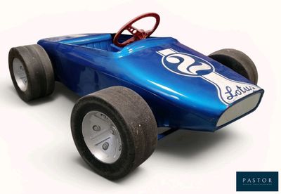 a blue toy race car with a steering on a white background