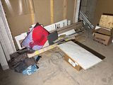 a pile of boxes and other items in a room