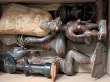 a box full of african artifacts in a box