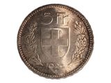 gros plan d'une pièce de monnaie sur une surface blanche avec un fond blanc