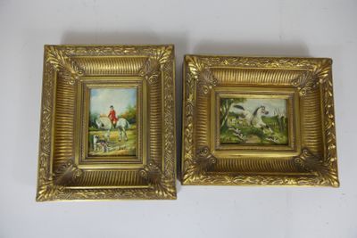 two framed paintings of a man and a dog in a landscape