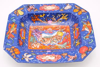 a blue bowl with a picture of a horse on it
