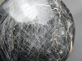 a close up of a ball of yarn on a table