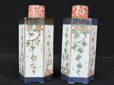 pair of antique chinese porcelain vases with flowers and birds on them