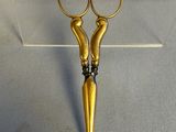 a pair of scissors that are sitting on a table