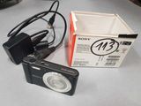 a sony camera and a box on a table