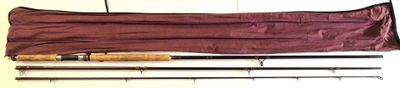 two rods and a bag on the floor next to each other