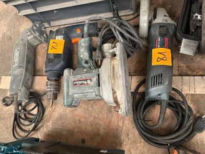 a lot of tools that are on the floor
