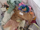 a bag full of clothes and other items in it