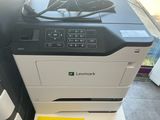 a printer that is sitting on top of a table