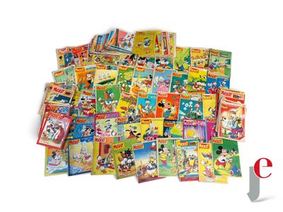 a pile of cartoon books on a white surface