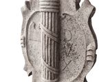 a stone object with a design on it on a white surface