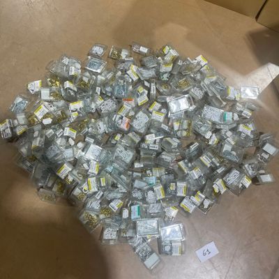 a pile of money sitting on the floor next to a box