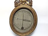 a clock that is hanging on the wall in the room