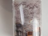 a roll of tape that has a picture of a living room on it